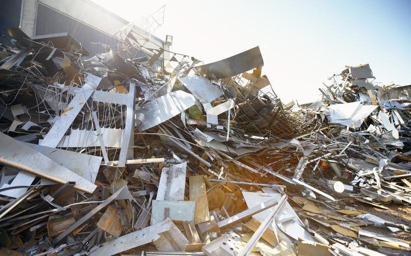 Mixed scrap metal being converted to cash